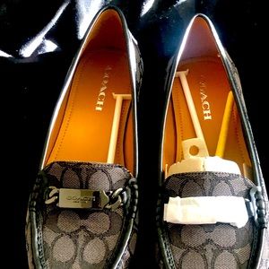 Coach black smoke slip in’s  size 10